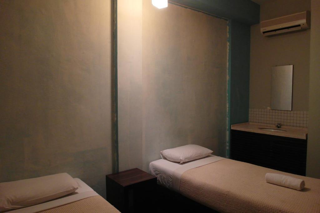 Number Eight Guesthouse クアラルンプール 部屋 写真